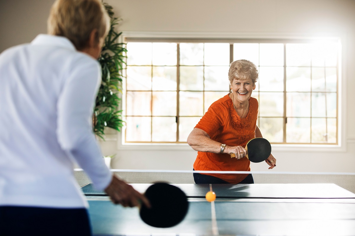 Retirement village residents playing table tennis
