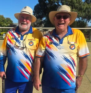 two older men in yellow and blue bowling uniforms